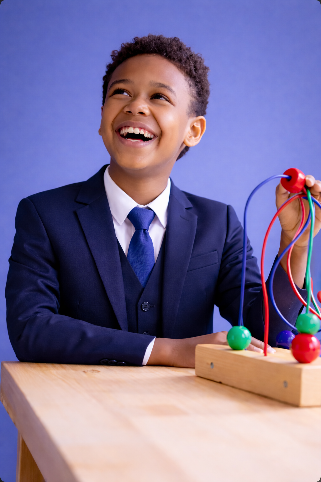 Student boy with toy